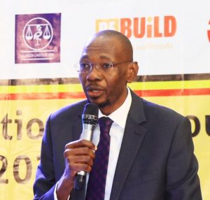 Hon. Jackson Kafuzi, the Deputy Attorney General, officially opened day two of the Annual National Labour Convention Expo on-going aa Mestil Hotel