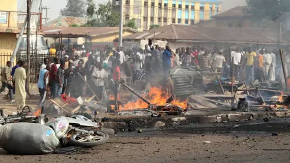 Suspected female suicide bombers kill at least 18 in Nigeria, authorities say