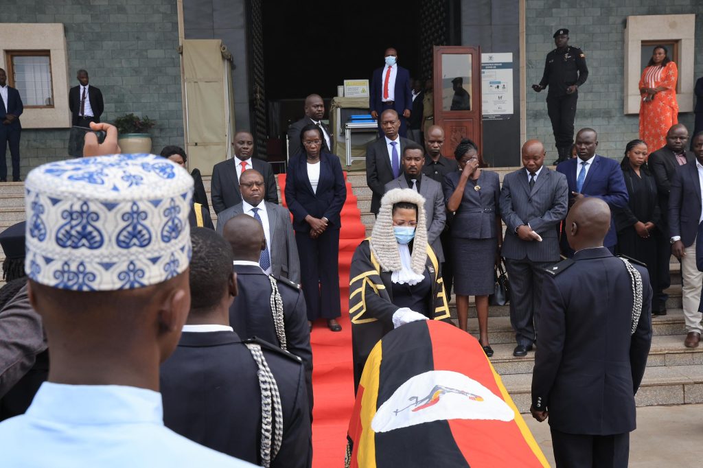 Speaker Anita Among receives the body of the late Kawempe North MP Muhammad Ssegirinya